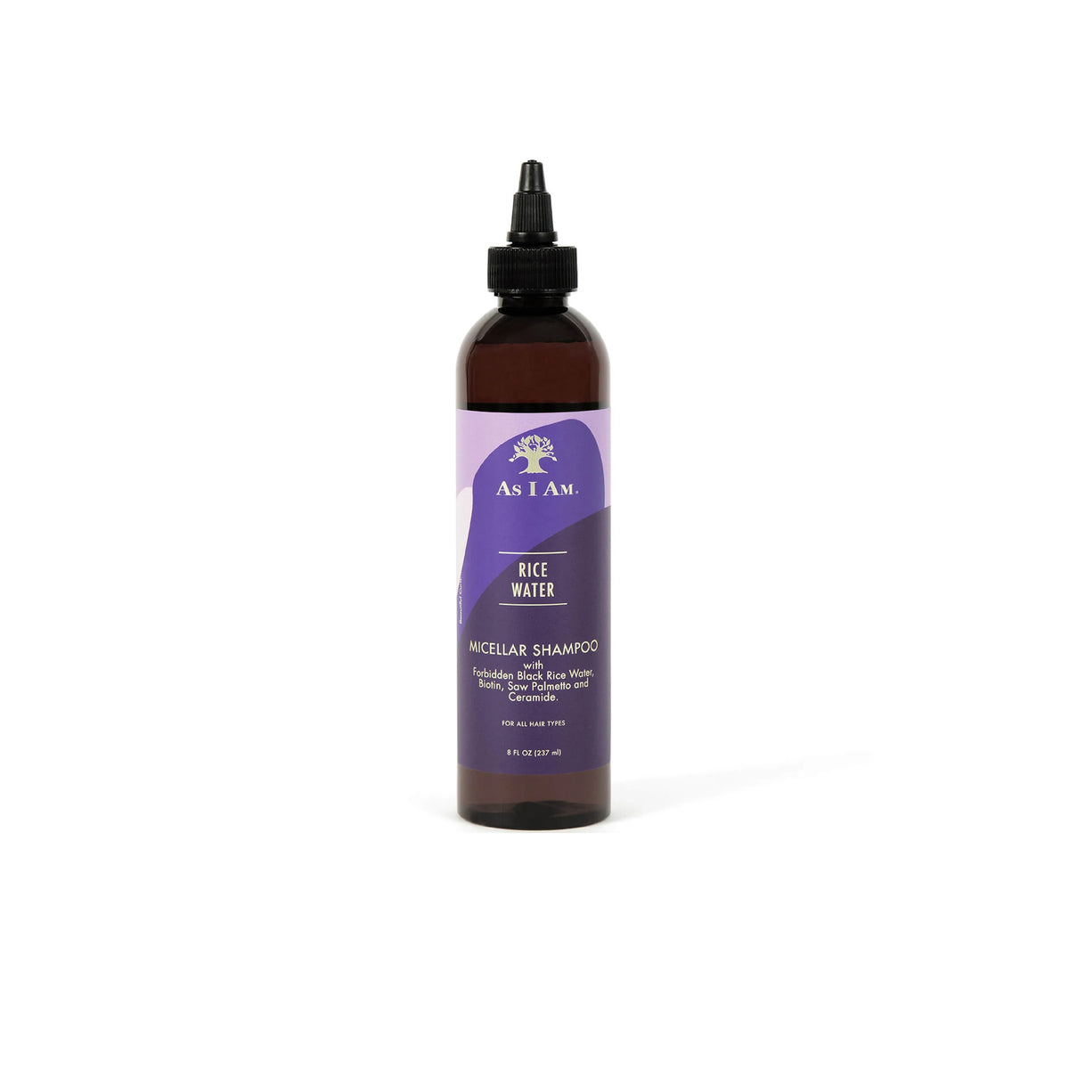 A brown bottle of As I Am Rice Water Micellar Shampoo (237 ml) with a purple label showing the product name and brief description.