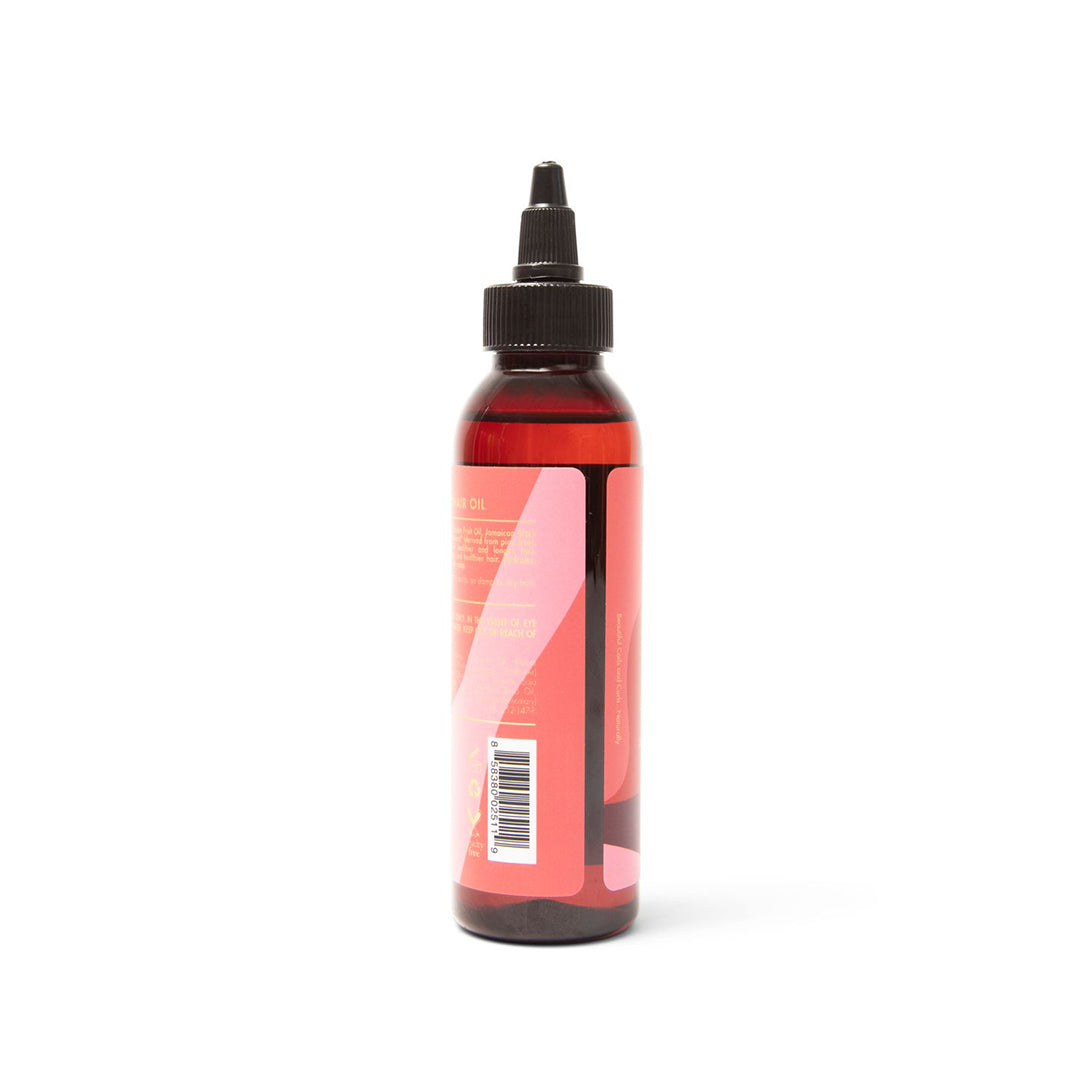 The side of a bottle of As I Am Long and Luxe GroHair Oil.