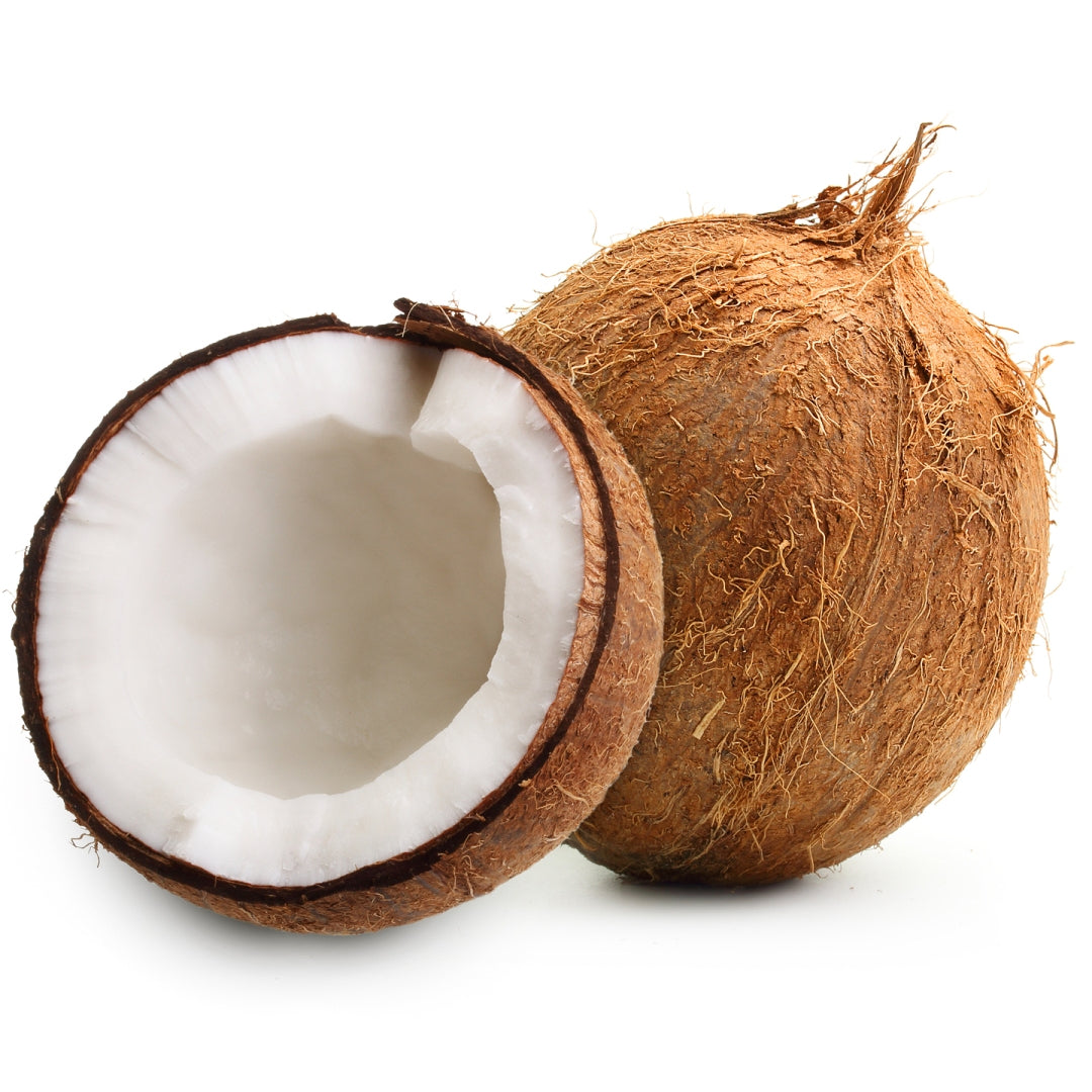 Two coconuts, one whole and one halved, illustrating the main ingredient in Aunt Jackie's Curl Boss Coconut Curling Gelée.