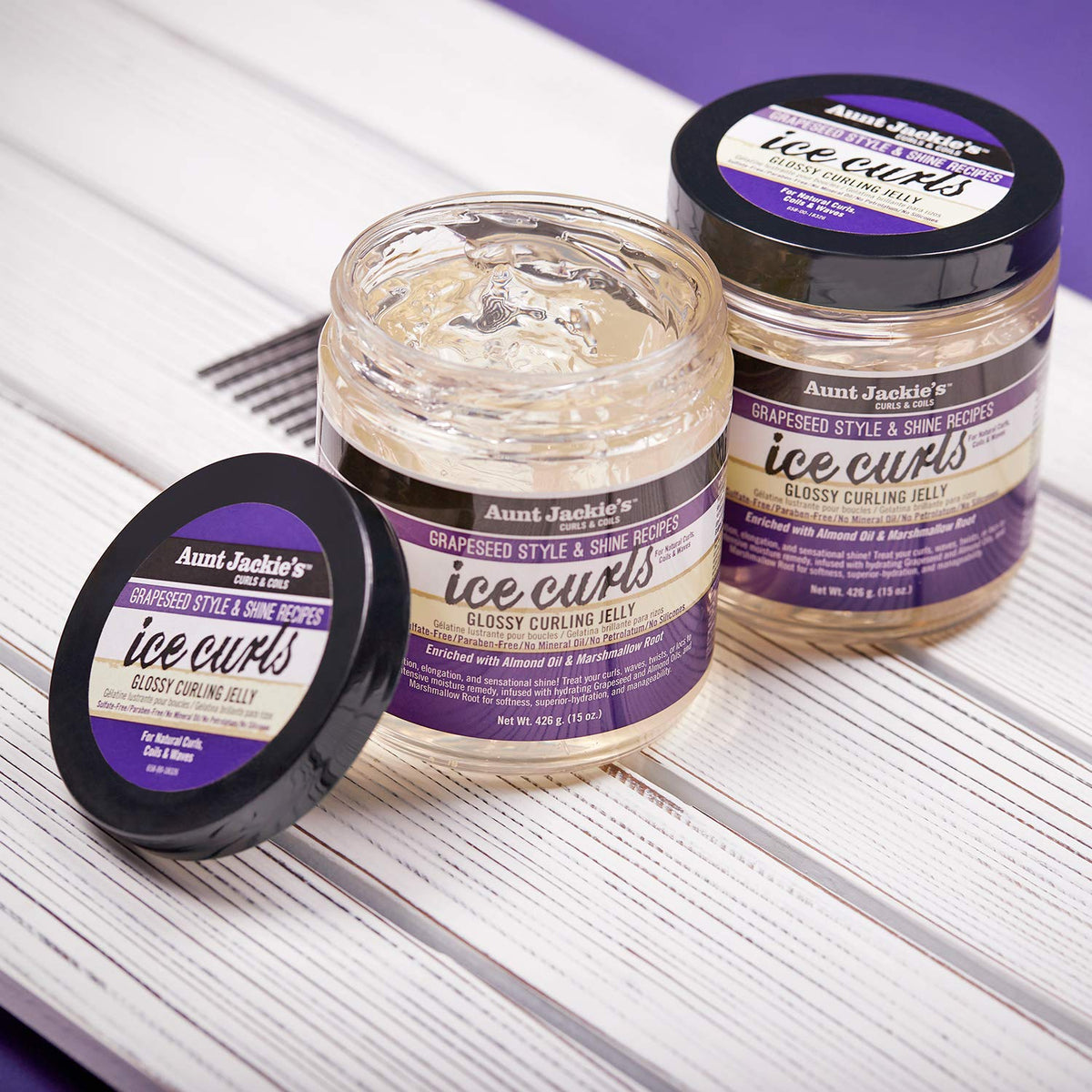 Three containers of Aunt Jackie's Ice Curls Glossy Curling Jelly.