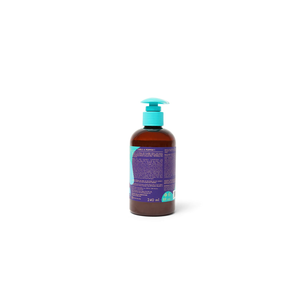 Back of a brown plastic bottle with a blue pump. The bottle contains As I Am Born Curly Avocado Shea Co-Wash. The label shows product information such as ingredients and instructions for use.