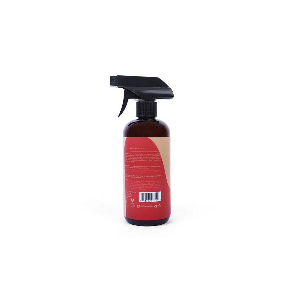 The back of a dark spray bottle of As I Am Jamaican Black Castor Oil Water (473 ml) with a pink label containing the ingredients list, instructions for use and barcode.