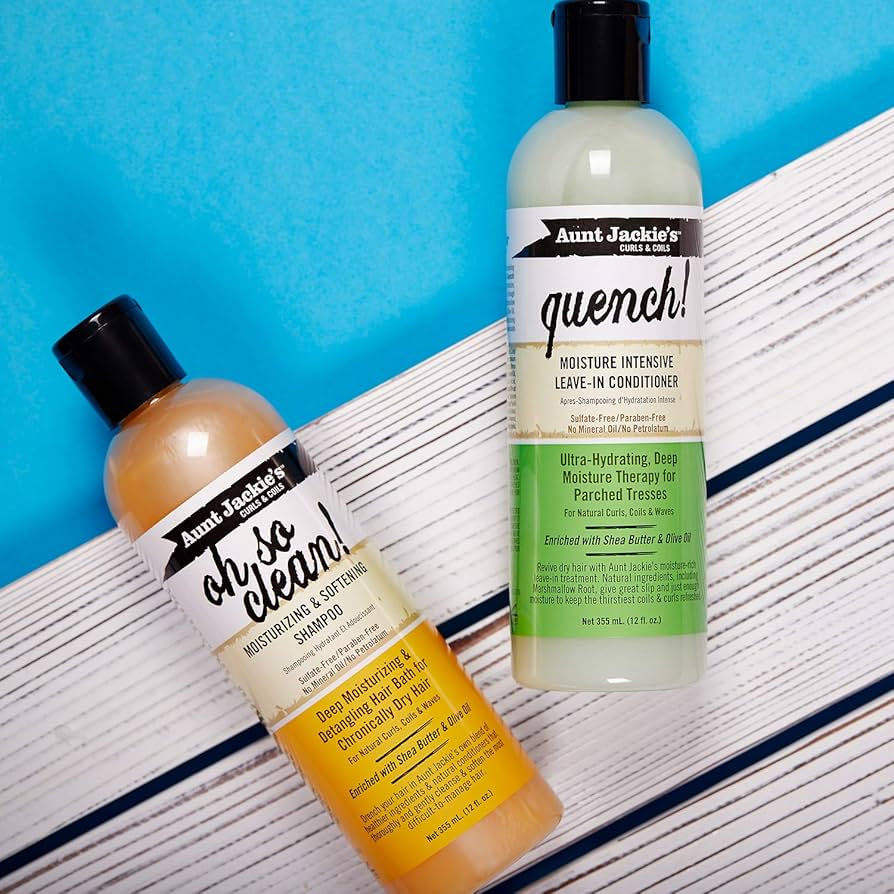 Image of two hair care products from Aunt Jackie's Curls & Coils: "Oh So Clean Moisturizing & Softening Shampoo" (front) and "Quench! Moisture Intensive Leave-In Conditioner" (back).