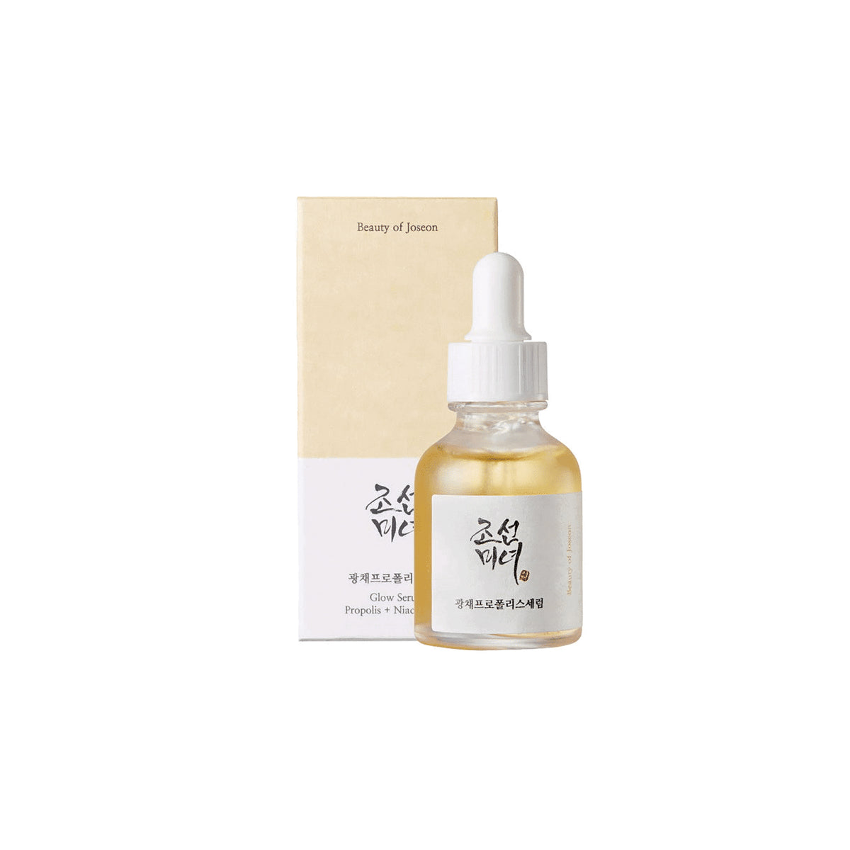 Glass bottle with Beauty of Joseon Glow Serum: Propolis + Niacinamide 30ml in front of matching beige and white packaging.