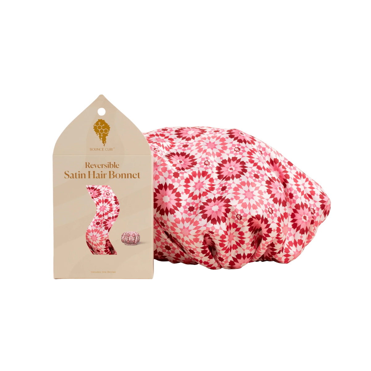 Reversible Satin Hair Bonnet in pink floral pattern with beige packaging and elastic, from Bounce Curl.