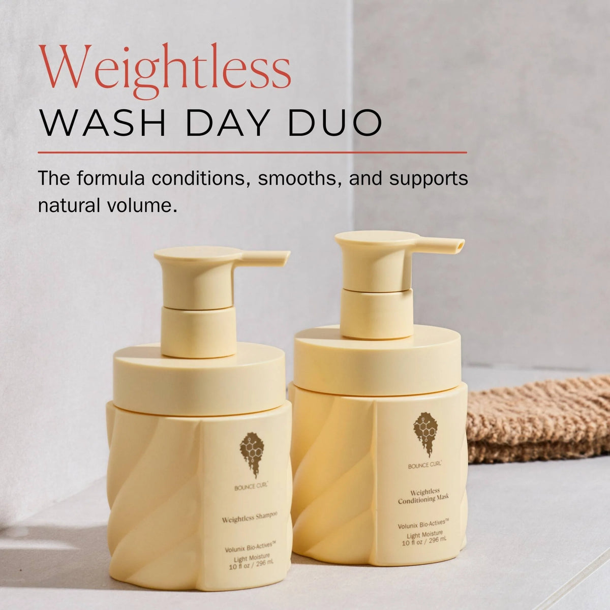 Weightless Wash Day Duo shampoo and conditioning mask in beige bottles with pump dispensers from Bounce Curl, designed for natural volume and shine.