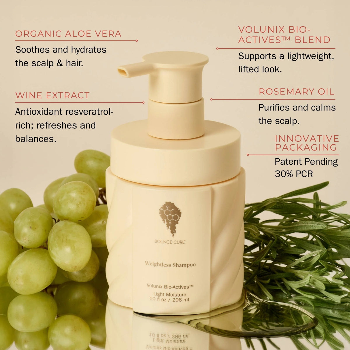 Bounce Curl Weightless Shampoo with Volunix Bio-Actives surrounded by green grapes and rosemary branches that showcase organic ingredients.