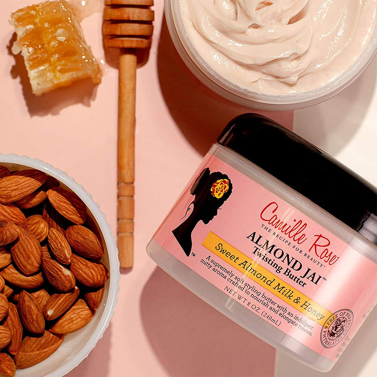 Camille Rose Almond Jai Twisting Butter is highlighted with its natural ingredients: almonds and honey.
