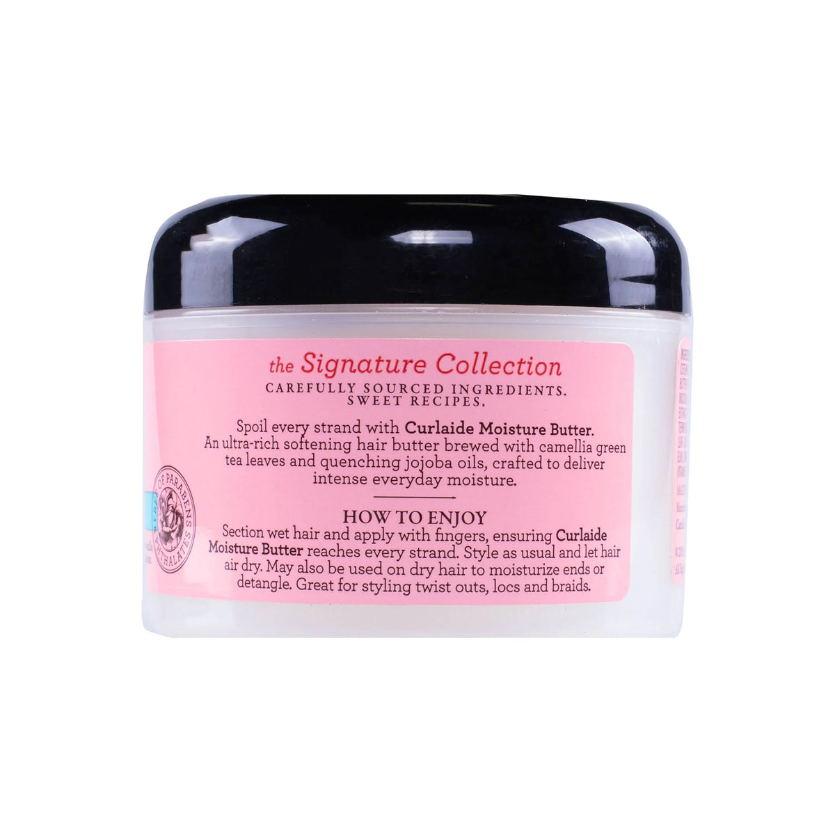 Close-up of the back of a clear container of Camille Rose Curlaide Moisture Butter showing directions for use and ingredients.