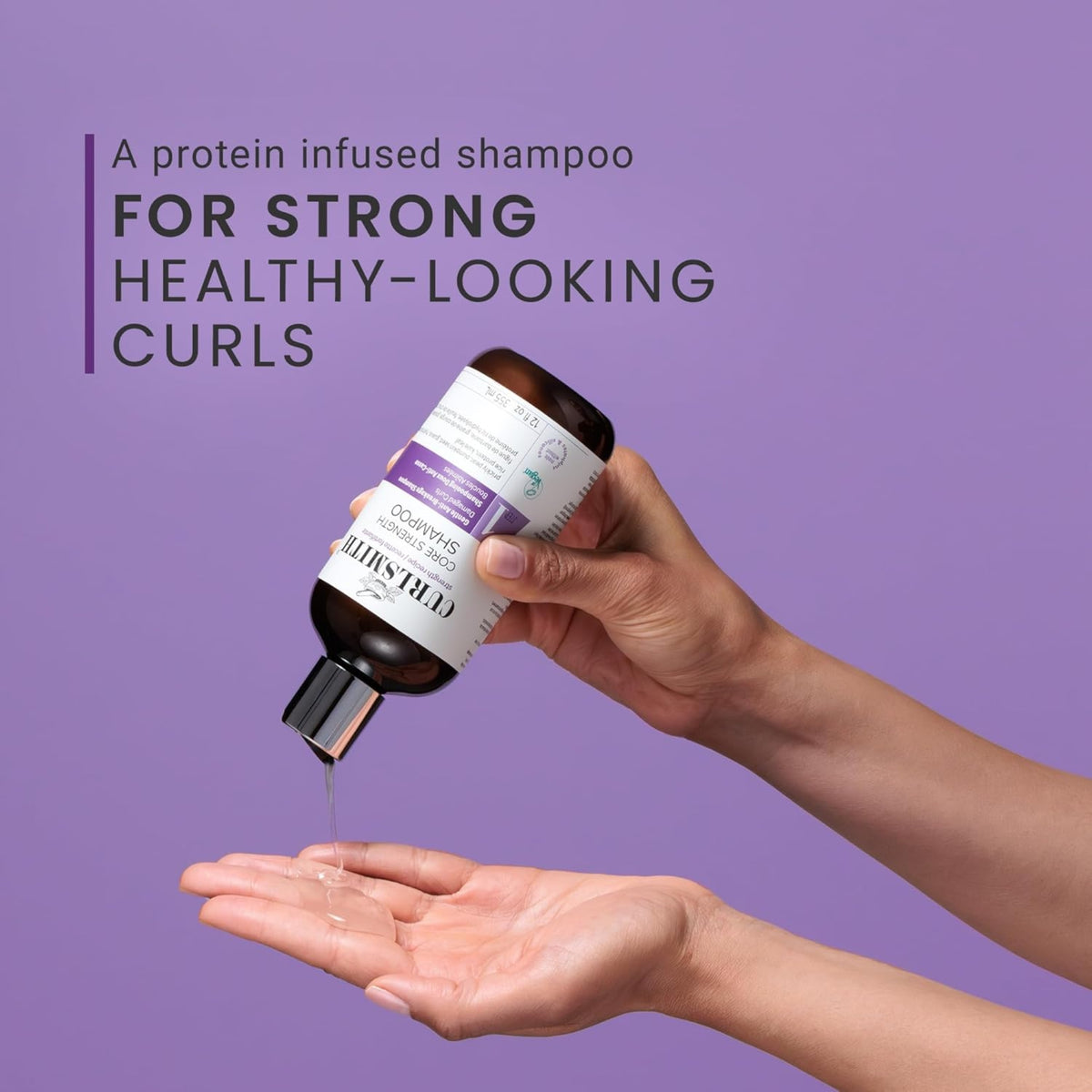 Hand pours Curlsmith Core Strength Shampoo into the palm of your hand, protein infused shampoo for strong curls.