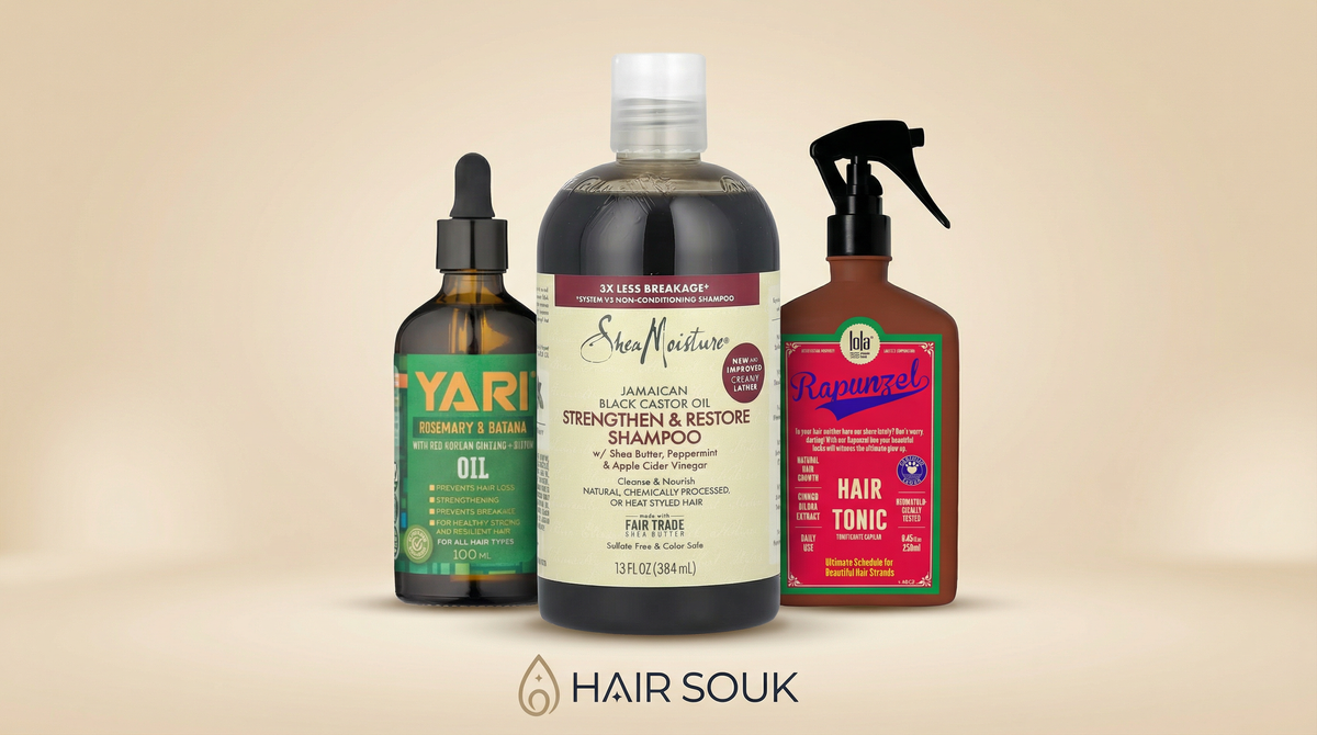 Three hair care products from the Hair Growth Boost Bundle on a beige background with a focus on shampoo, oil and tonic.