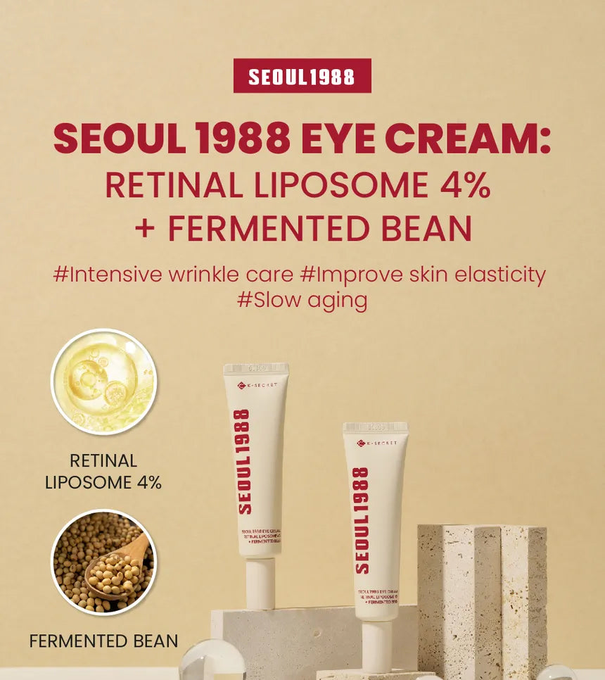 Two tubes of K-Secret Eye Cream: Retinal Liposome 4% + Fermented Bean stand upright on light stones with a beige background.