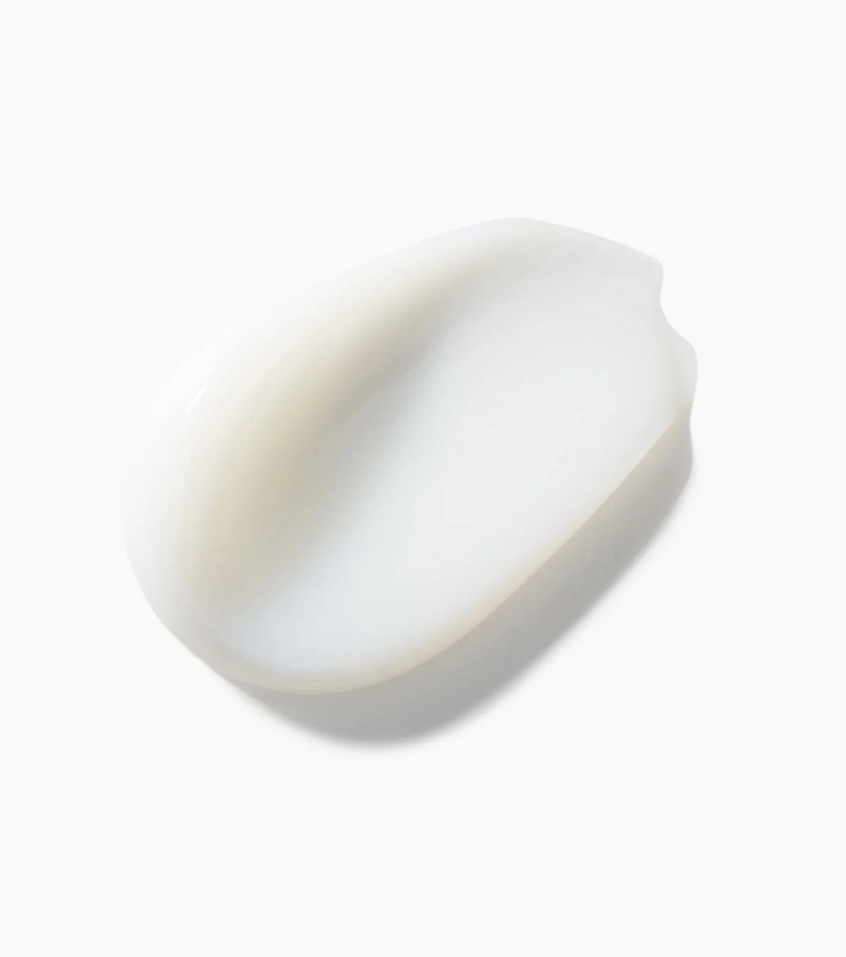 Keracare Curlessence moisturizing curl cream. Close-up of the cream's soft, white texture.