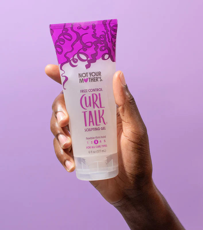 A hand holds Not Your Mother's Curl Talk Frizz Control Sculpting Gel in front of purple background.