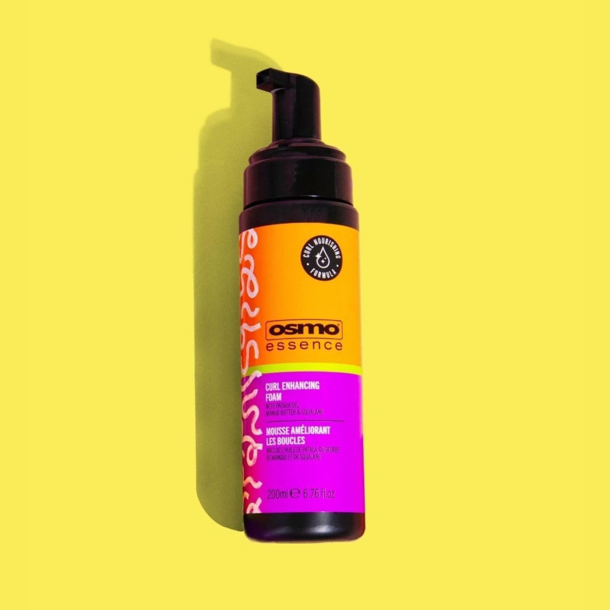 Osmo Essence Curl Enhancing Foam, 200 ml pump bottle in orange and purple on a yellow background.