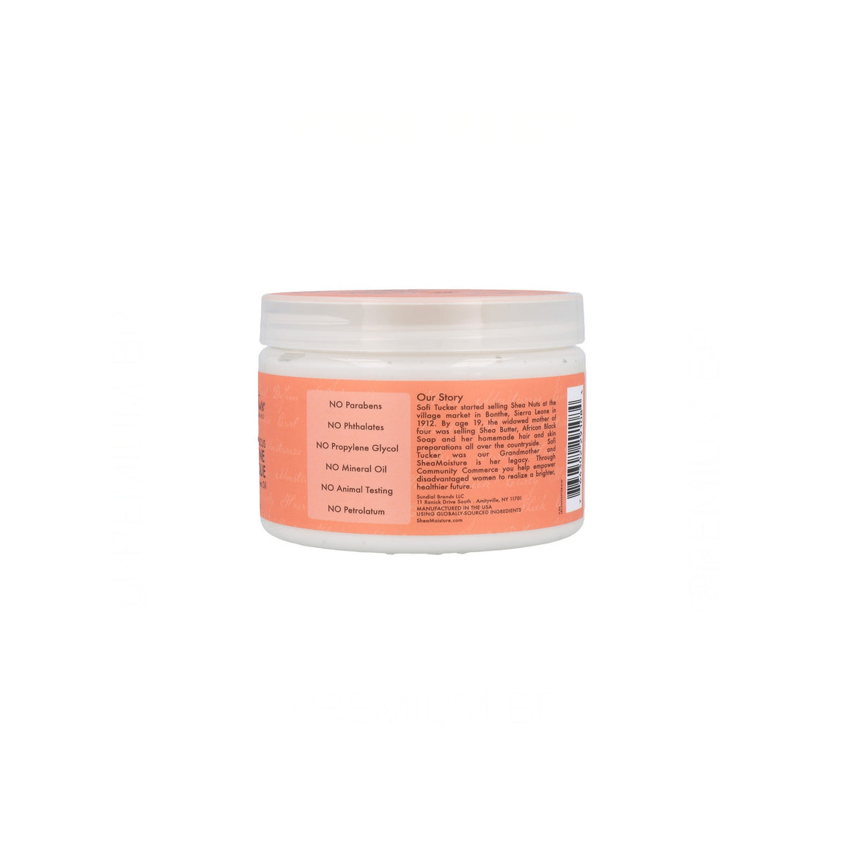 Close-up of the back of a white plastic container of Shea Moisture Coconut & Hibiscus Curl & Shine Hair Masque (340g), showing the brand's history of Sofi Tucker and a list of ingredients the product does not contain.