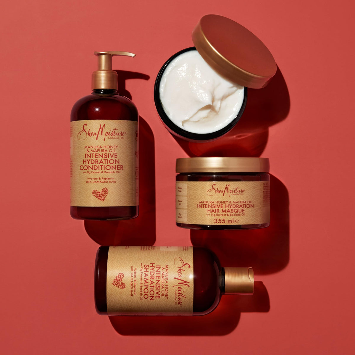 Shea Moisture Manuka Honey & Mafura Oil Intensive Hydration Shampoo, Conditioner (354ml) and Hair Masque (355ml) shown together.