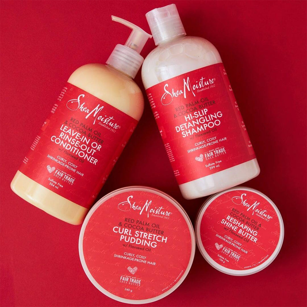 Shea Moisture Red Palm Oil & Cocoa Butter product line. The photo shows four products: Hi-Slip Detangling Shampoo, Leave-In or Rinse-Out Conditioner, Curl Stretch Pudding and Reshaping Shine Butter, all intended for curly and frizzy hair.