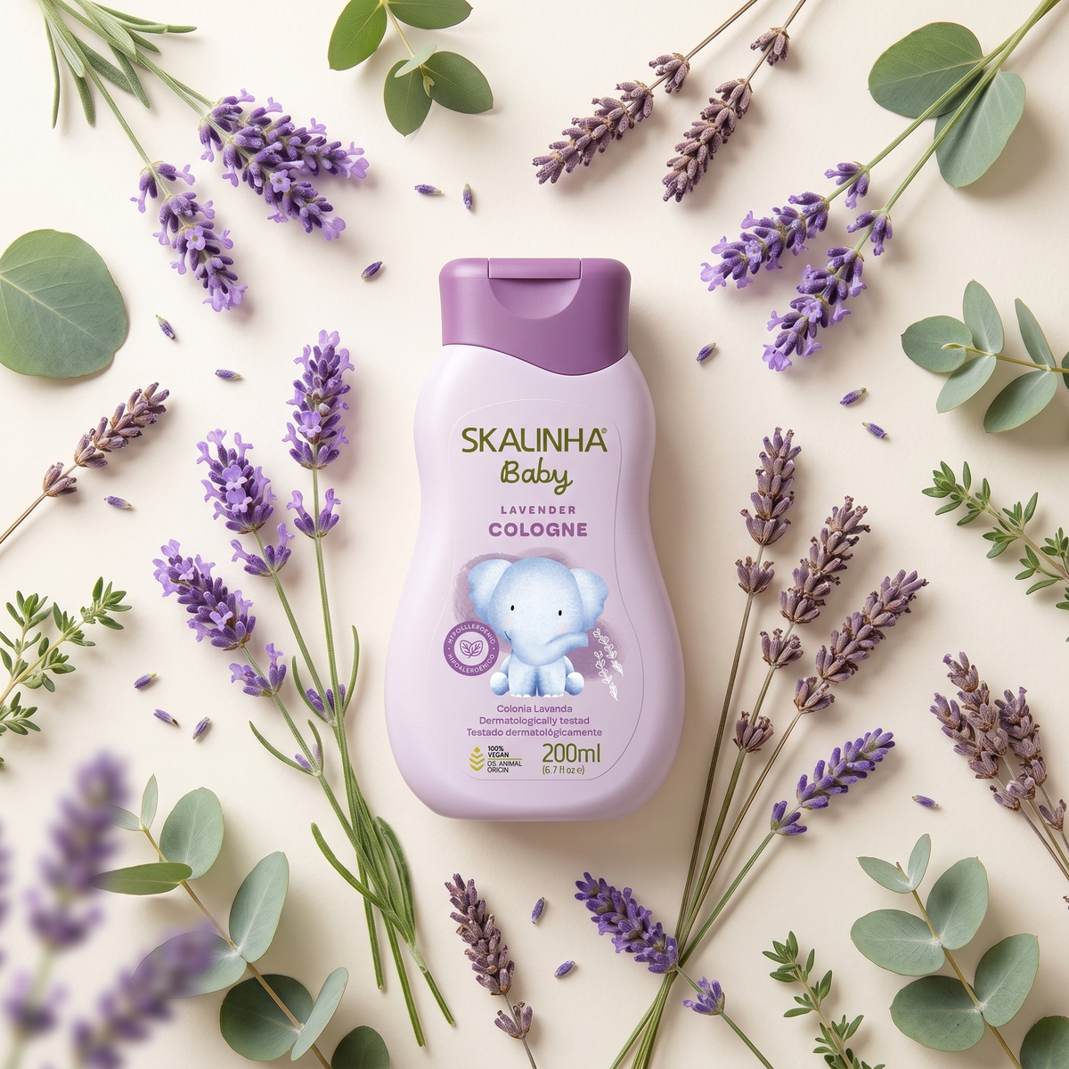 Skalinha Baby Lavender Cologne in purple bottle with elephant surrounded by lavender and eucalyptus.