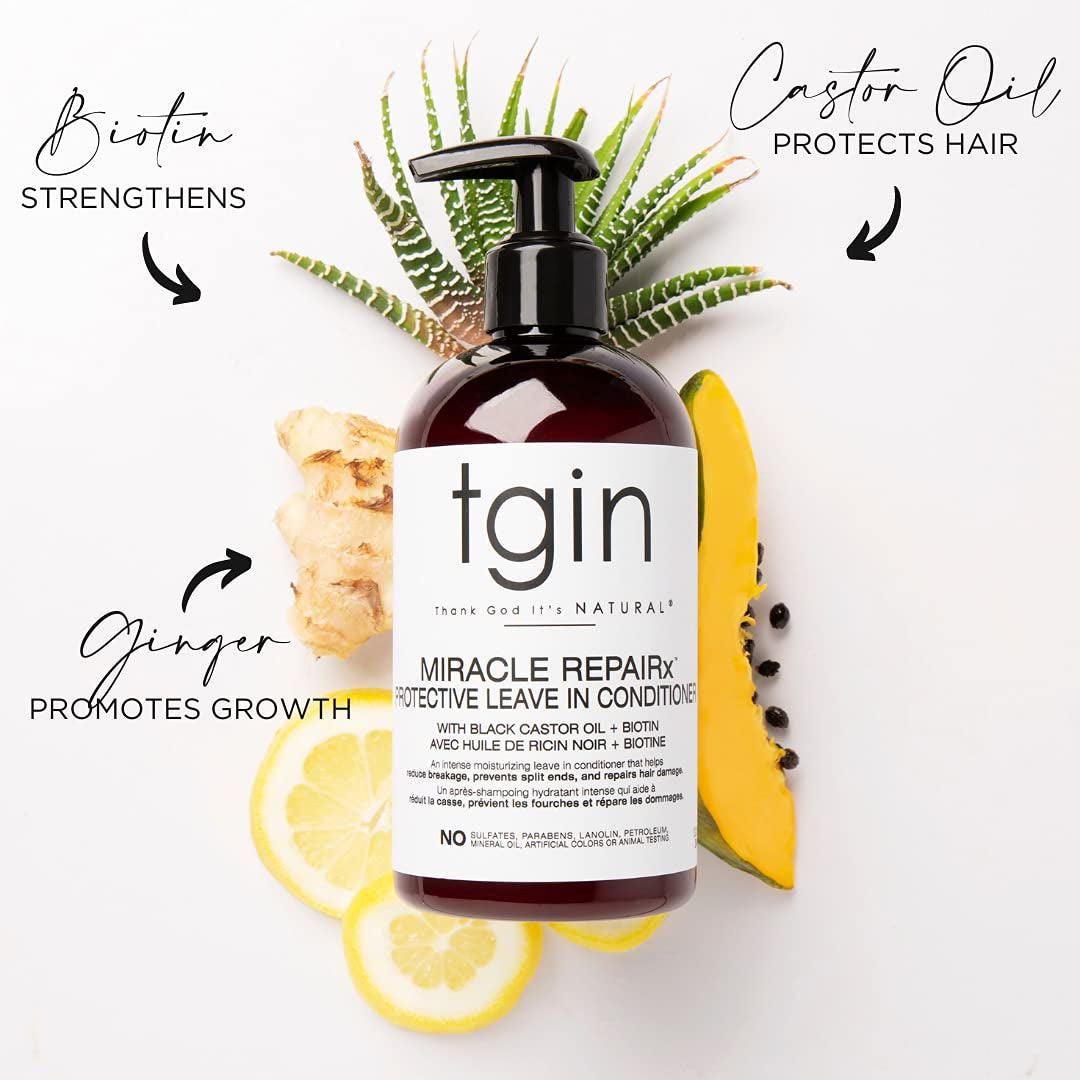 TGIN Miracle RepairX Protective Leave-in Conditioner 384ml surrounded by ginger, aloe vera, lemon and papaya on a light background.