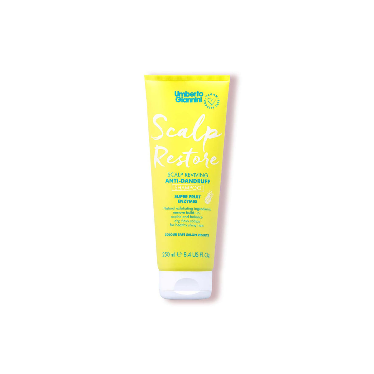 Yellow tube of Umberto Giannini Scalp Restore anti-dandruff shampoo with superfruit enzymes for shiny, healthy hair.